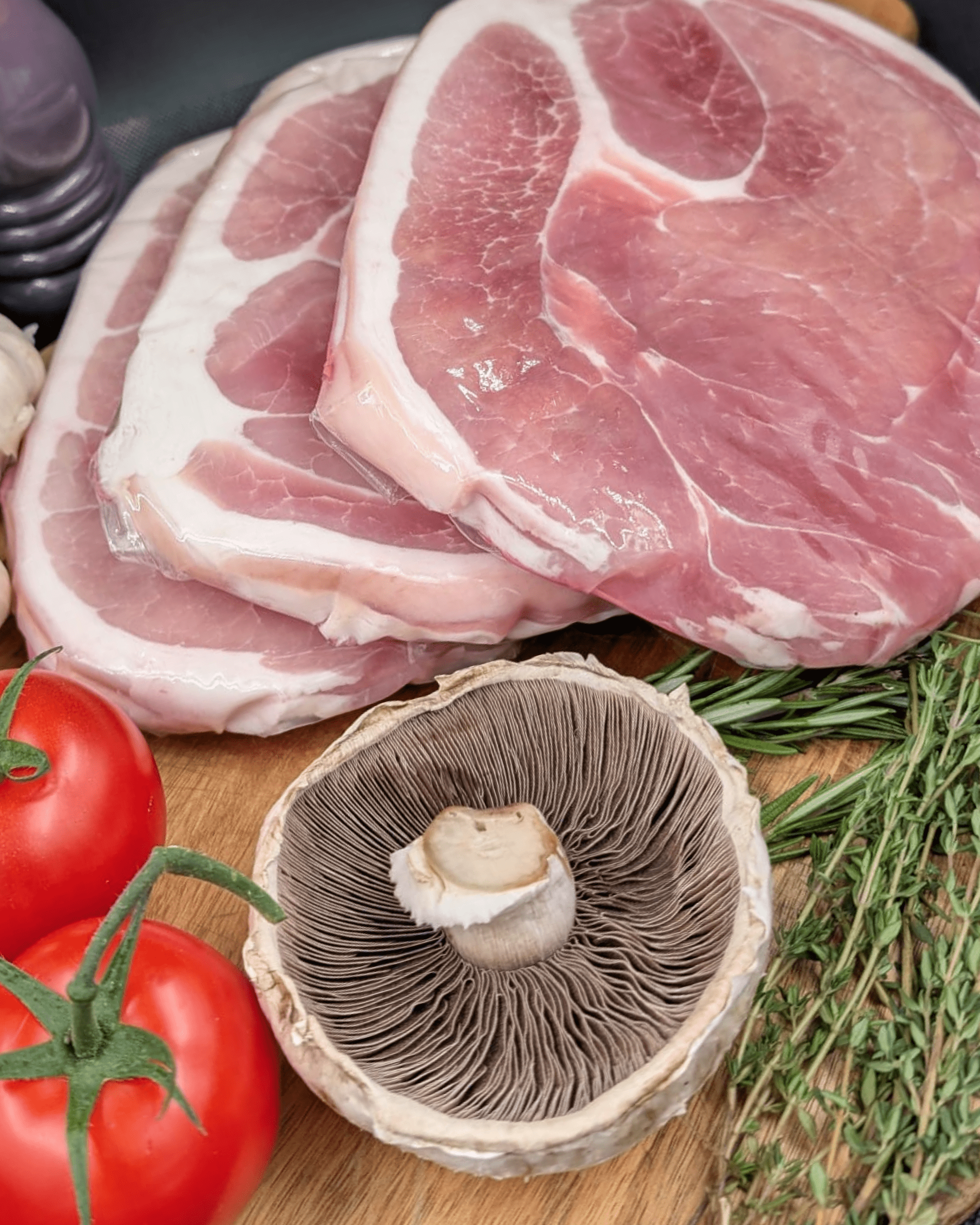 Gammon rashers with a selection of herbs and vegetables